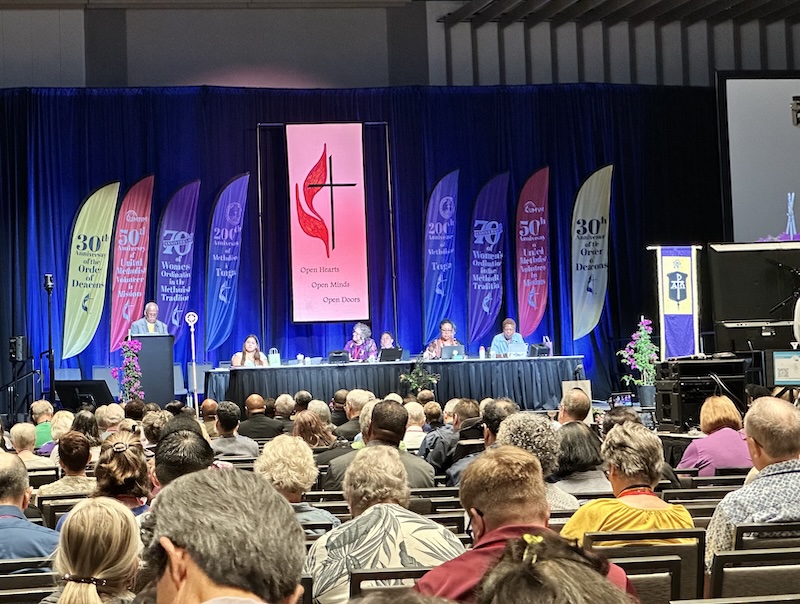 leadership dais with decade anniversary banners